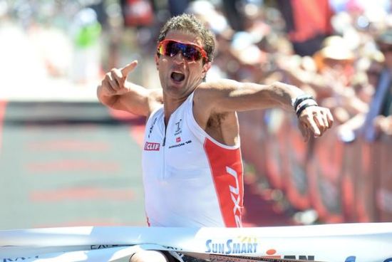 Terenzo Bozzone celebrates victory in Ironman 70.3 Mandurah in Western Australia