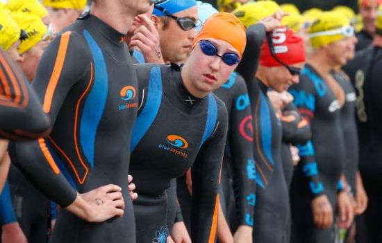 Emma Robinson (orange cap) looking out of the line before the start of the Harbour Crossing in 2013