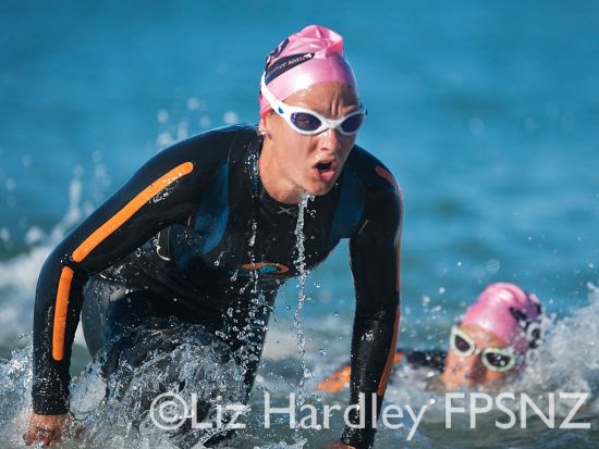 Penny Hayes leading Rebecca Clarke out of the swim