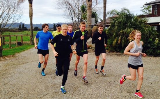 Athletes head out on a run session while in camp at Cambridge