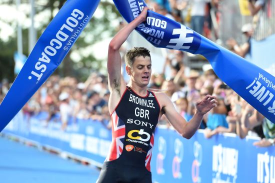 Jonathan Brownlee takes the tape