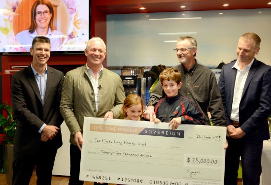 Pictured from left are Marty Grenfell, Whakatne District Council Chief Executive; Symon Brewis-Weston, Sovereign Insurance Chief Executive; Paget, Tyler and Rob Lang; and TriNZ Chief Executive Craig Waugh. On screen in the background is Kirsty Lang.